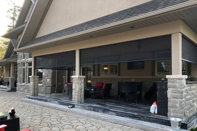 Motorized retractable screens for the patio